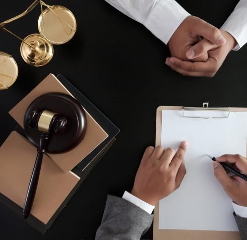 Businessman shaking hands Judge gavel with Justice lawyers  trust Promise Win the Case